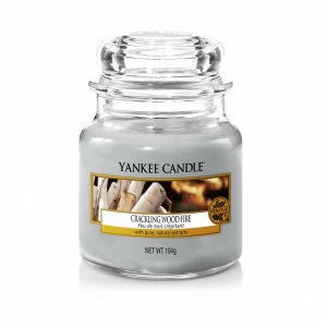 Свеча маленькая в стеклянной банке "Треск дерева в камине" Crackling Wood Fire 104гр 25-45 часов YANKEE CANDLE  267945 Бежевый