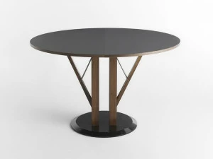 Casamania & Horm Круглый раздвижной стол из мрамора, массива дерева и феникса