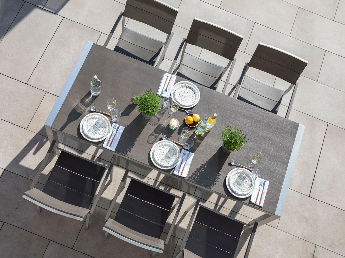 98.00.0862 Обеденный набор Brisbane из нержавеющей стали, 9 предметов. - включая 8 кресел из нержавеющей стали Brisbane / Resysta Stone Grey + 1 стол из нержавеющей стали Kennedy 90 × 215 Mbm 