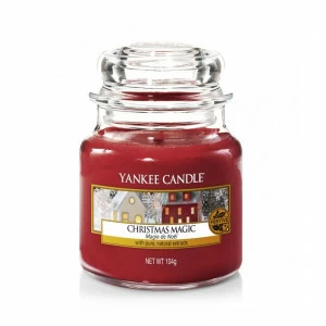 Свеча маленькая в стеклянной банке "Рождественское волшебство" Christmas Magic 104гр 25-45 часов YANKEE CANDLE  267930 Красный